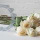 Illustration for article titled A Clever Plastic Brace Turns Long-Stemmed Flowers Into Their Own Vase